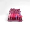 Pink and purple spherical cap lip gloss bottle with matte texture, portable design, fashionable beauty packaging Application Scenario